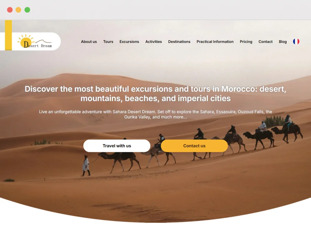 The Sahara Desert Dream home page, a camel caravan crossing the dunes at sunset